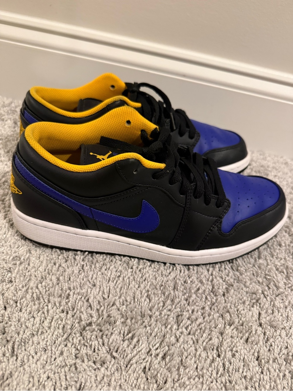 Jordan 1 Men’s Black, Royal Blue & Yellow Low-Top Sneakers